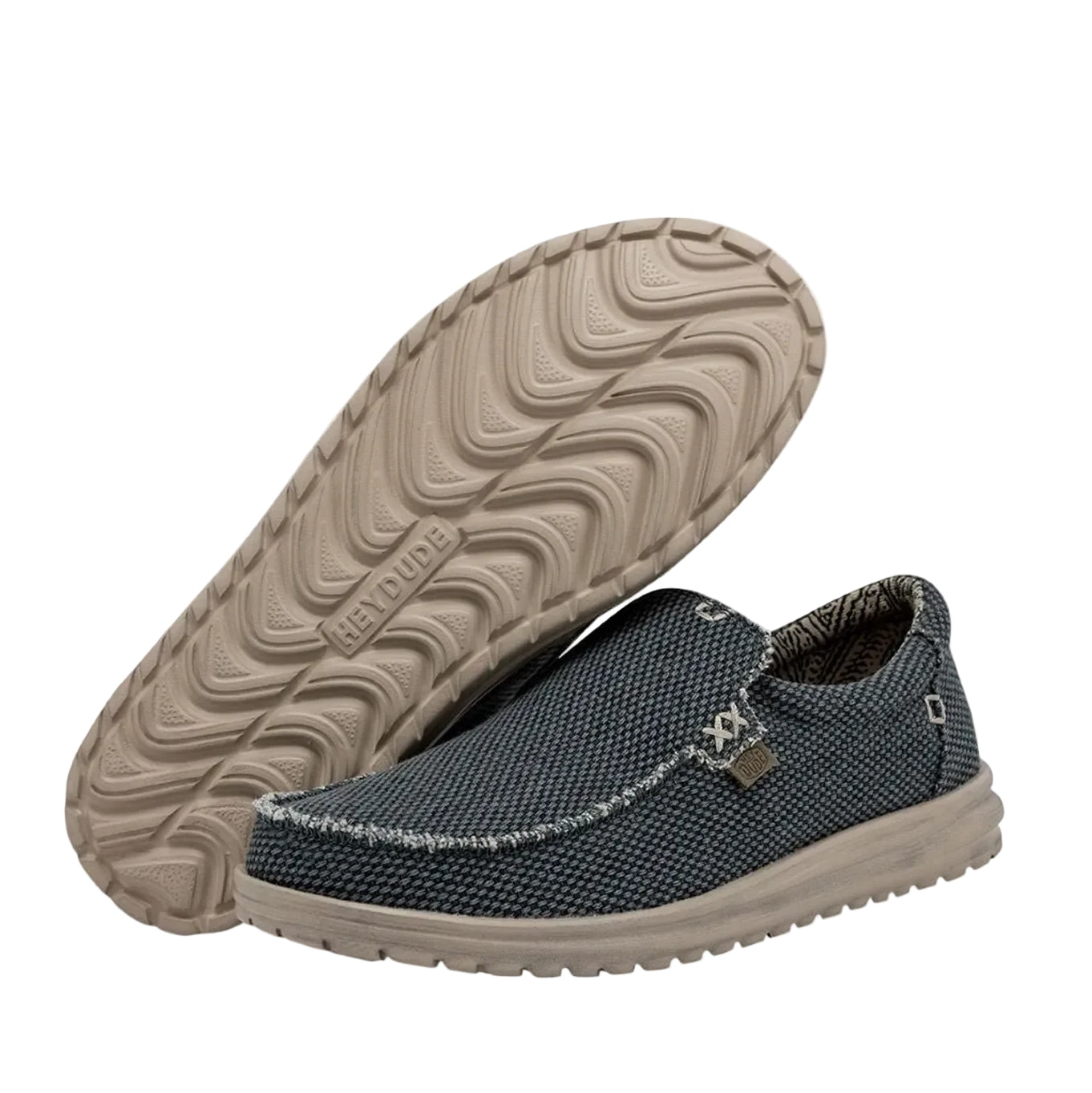 Men's Dude Mikka Braided lightweight slip on canvas shoes in Deep Blue, showing the EVA beige outsole of one shoe.