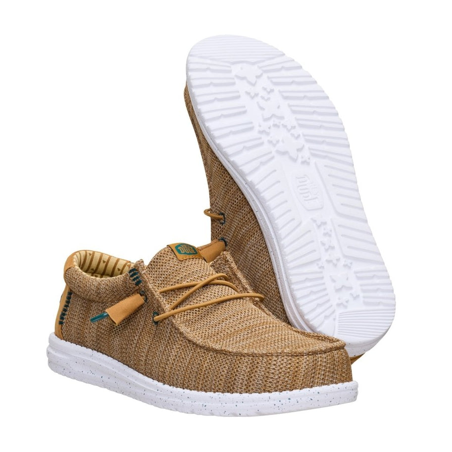 A pair of men's Dude Wally Stretch Sox lightweight mesh shoes in Bone Brown / Multi, with elastic laces and showing the bottom white outsole.