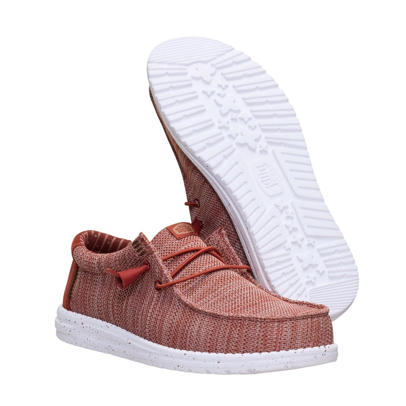 A pair of men's Dude Wally Stretch Sox lightweight mesh shoes in Burnt Red / Multi, with elastic laces and showing the bottom white outsole.