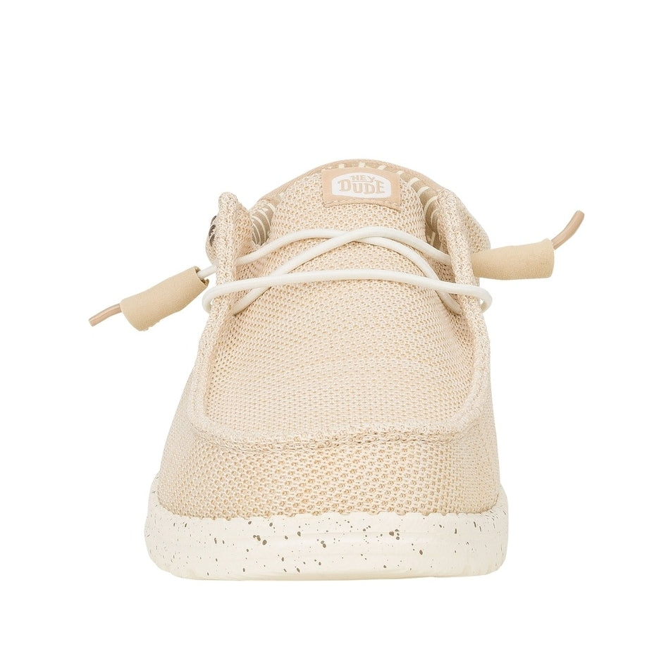 Front toe view of a men's Dude Wally Stretch Sox mesh shoe in Irish Cream / Egret with elastic laces, speckled sole and Hey Dude logo patch on the tongue.