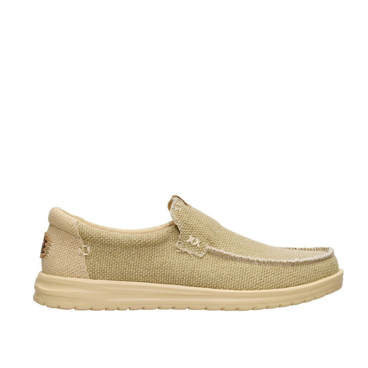 Side view of a men's Dude Mikka Braided lightweight slip on canvas shoe in Olive Grey / Boulder Tan.