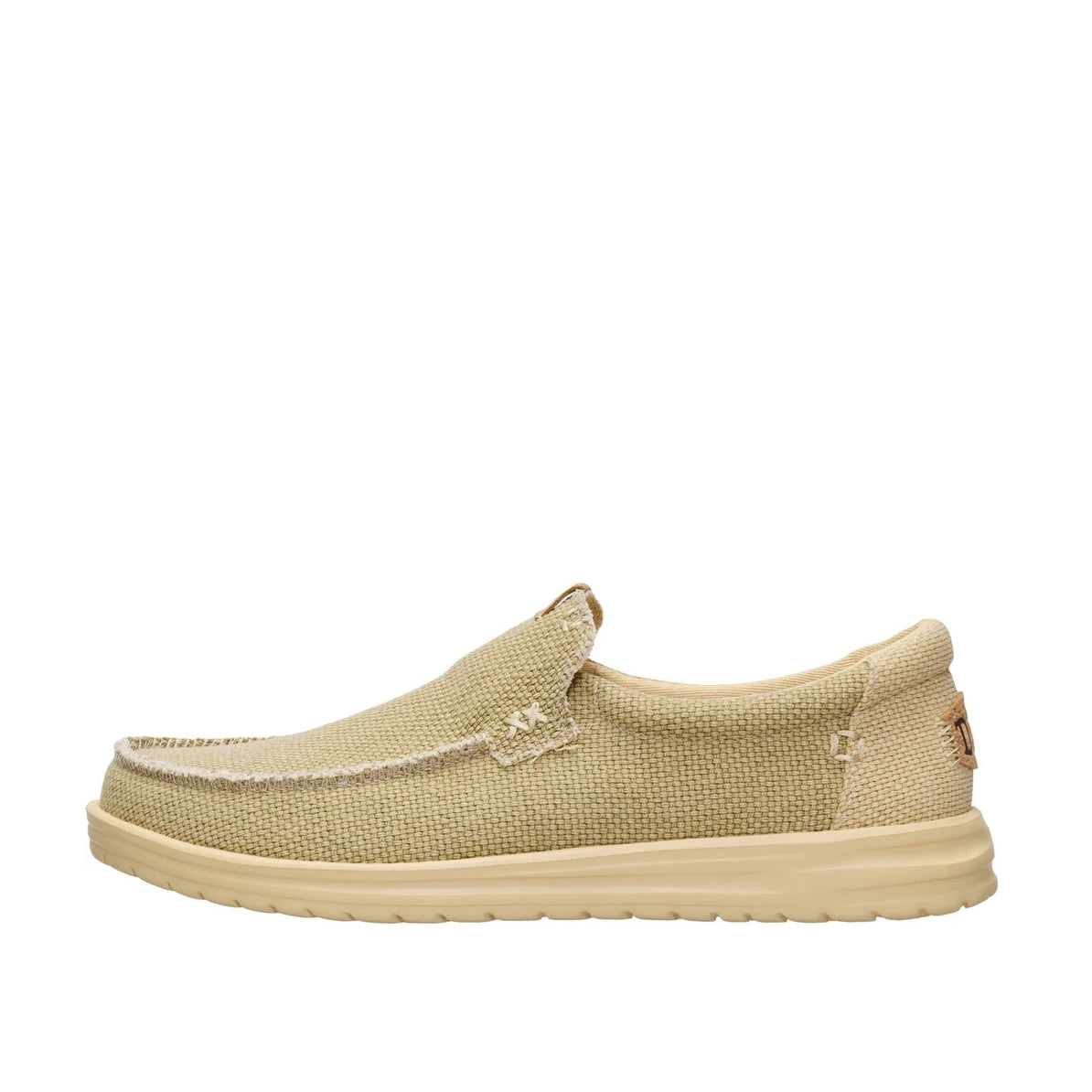 Side view of a men's Dude Mikka Braided lightweight slip on canvas shoe in Olive Grey / Boulder Tan with plain cream back panel.
