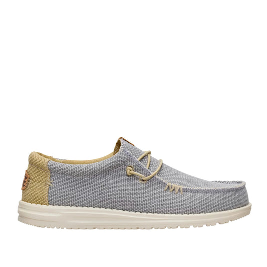 Side view of a men's Dude Wally Braided lightweight canvas shoe in Flannel Grey / Olive Grey in a slip on style with laces.