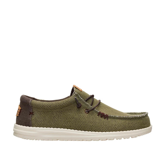 Side view of a men's Dude Wally Braided lightweight canvas shoe in Burnt Olive / Delicioso Brown in a slip on style with laces.