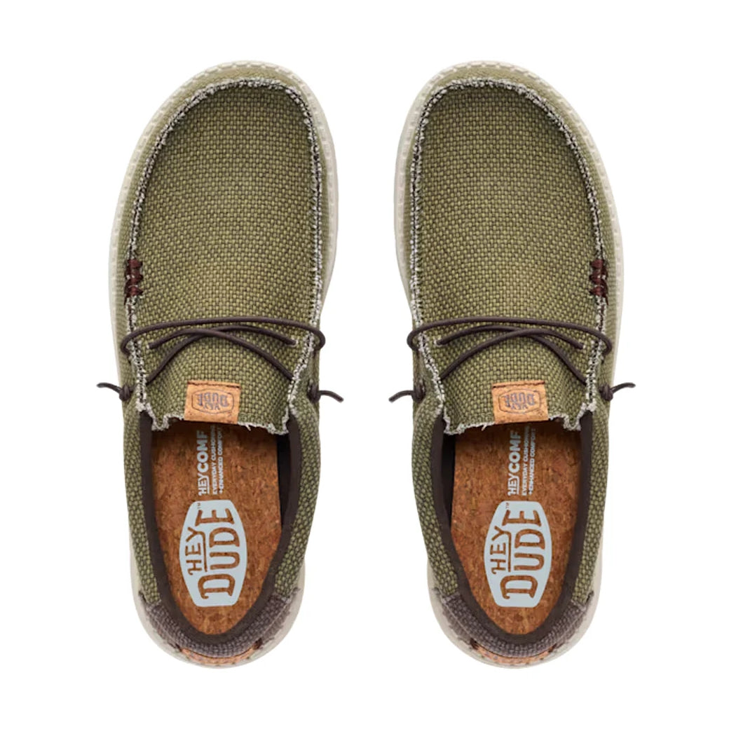 Top view of a pair of men's Dude Wally Braided lightweight canvas shoe in Burnt Olive / Delicioso Brown in a slip on style with laces and cork effect insole with Hey Dude logo.