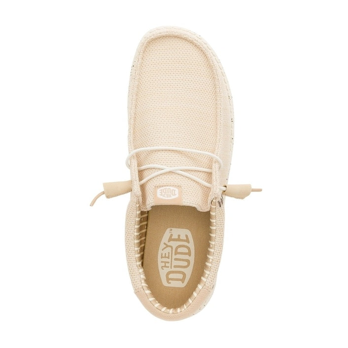 Top view of a men's Dude Wally Stretch Sox lightweight mesh shoe in Irish Cream / Egret, with elastic laces and a removable insole with Hey Dude logo.