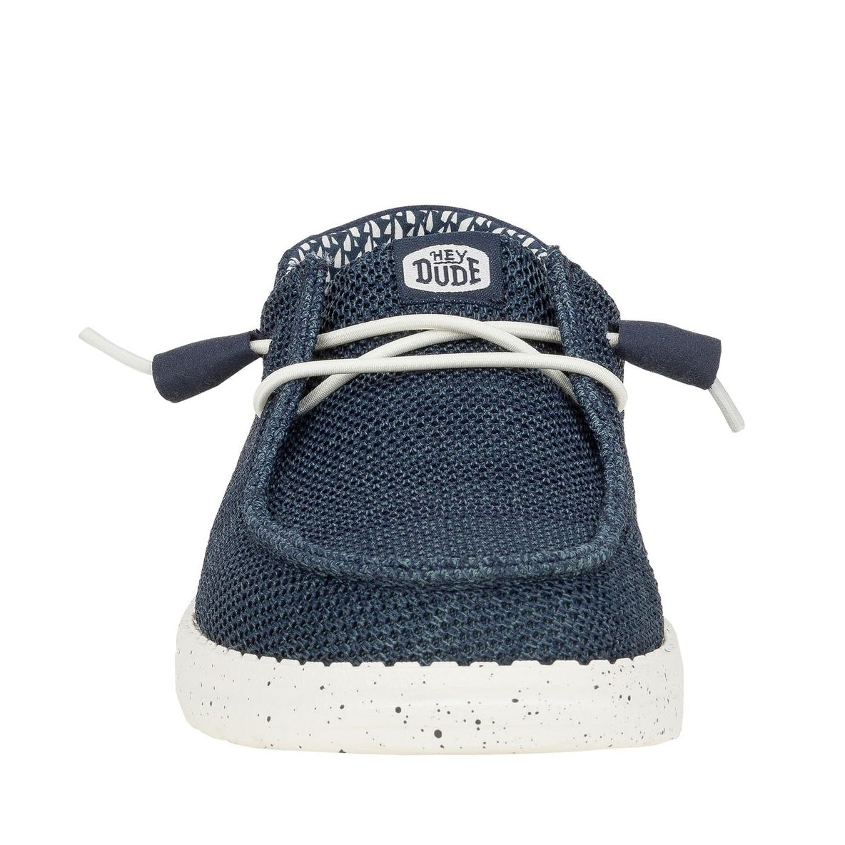 Front toe view of a women's Dude Wendy Stretch Sox shoe in Navy, featuring white elastic laces and logo label on the tongue.