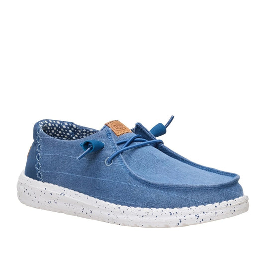 Main front view of a women's Dude Wendy Chambray Grid shoe in Ensign Blue, featuring a white sole and matching blue elastic laces.