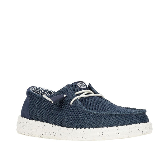 Main front view of a women's Dude Wendy Stretch Sox shoe in Navy, featuring a white sole and elastic laces.