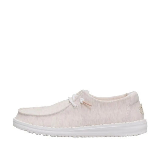 Side view of a women's Dude Wendy Stretch Jersey lightweight Summer shoe in Oatmeal, featuring a heathered upper fabric, white sole and elastic laces.