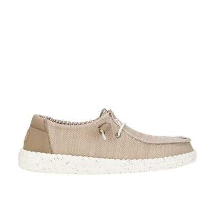 Side view of a women's Dude Wendy Stretch Sox shoe in Walnut beige/brown, featuring a white sole, elastic laces and plain brown heel panel.