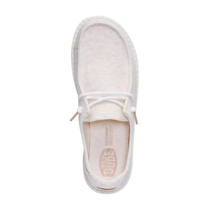 Top view of a women's Dude Wendy Stretch Jersey lightweight Summer shoe in Oatmeal, featuring a heathered upper fabric, elastic laces and removable insole with Hey Dude logo.