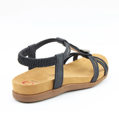 Back view of a Heavenly Feet womens Alison t-strap sandal in black with elastic ankle strap.
