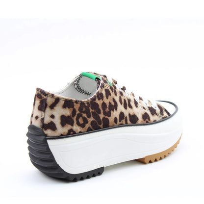 Back view of a Heavenly Feet womens Strata lace up canvas shoe in brown with cheetah animal print and white platform sole.