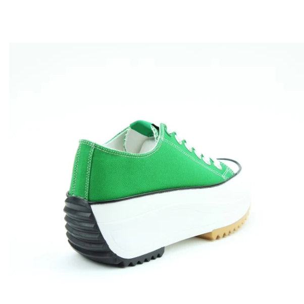 Back view of a Heavenly Feet womens Strata green lace up canvas shoe with white platform sole.