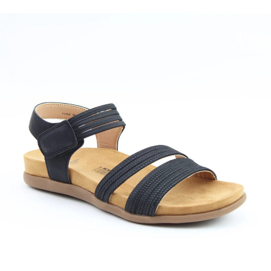 Main front view of a women's Heavenly Feet Tyra sandal in black with two front straps, adjustable ankle strap and a tan coloured sole.