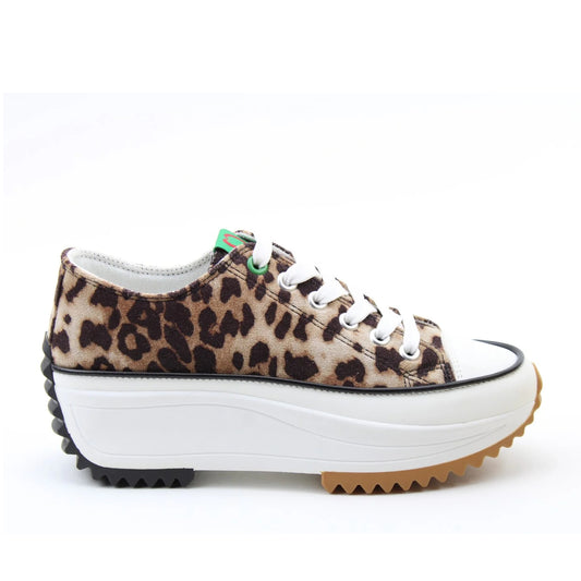Side view of a Heavenly Feet womens Strata lace up canvas shoe in brown with cheetah animal print and white platform sole.