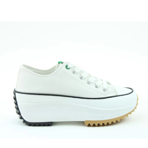 Side view of a Heavenly Feet womens Strata white lace up canvas shoe with white platform sole.