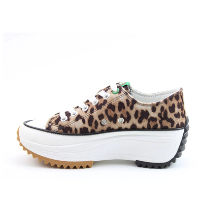 Side view of a womens Heavenly Feet Strata lace up canvas shoe in brown with cheetah animal print and white platform sole.