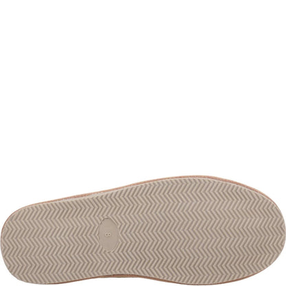 Close-up of a shoe sole with a zigzag pattern on a white background
