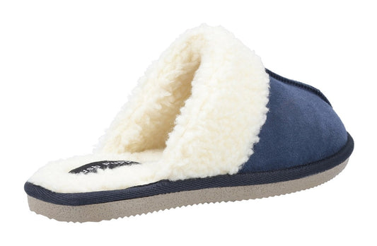 Back view of a Hush Puppies womens Arianna mule slipper in navy with a faux fur lining.