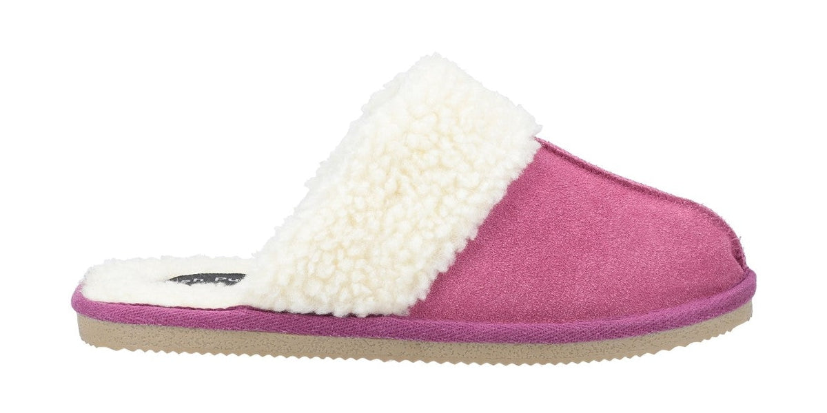 Side view of a women's Hush Puppies Arianna slipper in pink suede with fluffy cream trim.