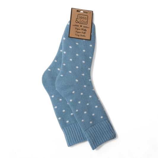 A pair of womens Jess and Lou cosy wool-blend socks in blue with a polka dot pattern on a white background.