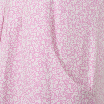 Close-up view a side pocket of a womens Lazy Jacks short sleeve LJ116 tunic in pink with a white ditsy floral pattern