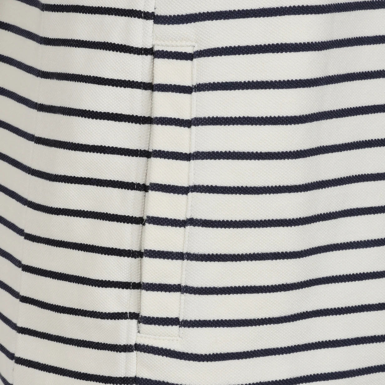 Close-up view of a pocket on a womens Lazy Jacks LJ304S full zip stripe sweatshirt in off white with Twilight navy stripes.