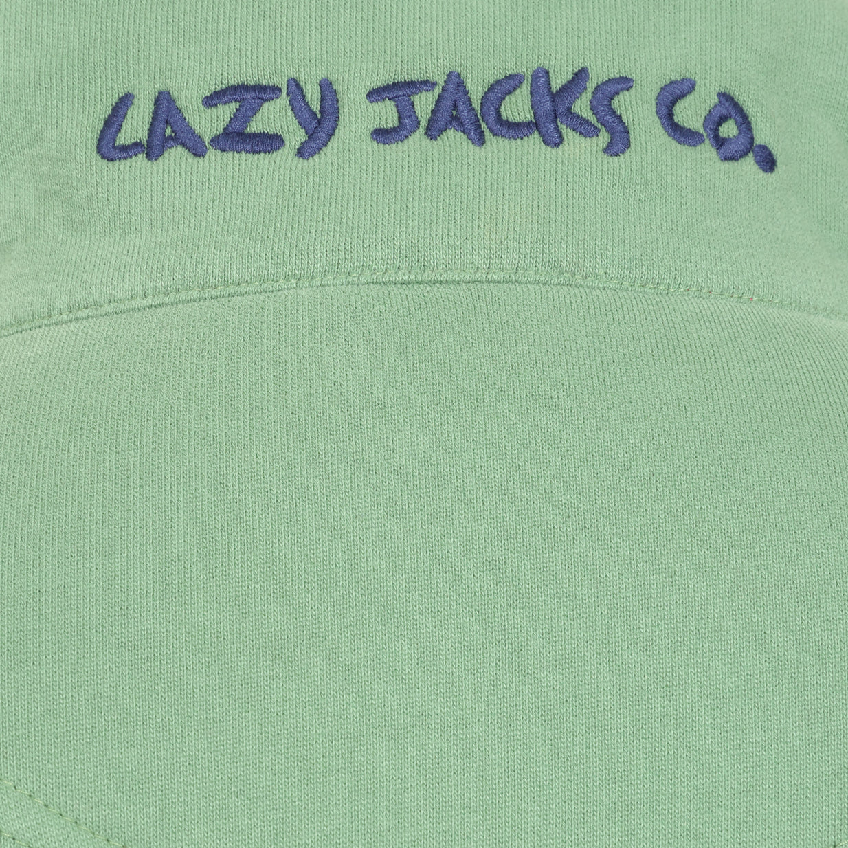 Close-up view of the embroidered logo on the back of the collar of a womens Lazy Jacks LJ33 zip through sweatshirt in Samphire Green.