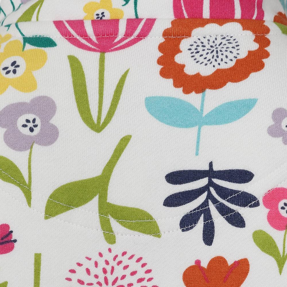 Close-up view of the vibrant multicolour floral 'Bouquet' print of a kids Lazy Jacks LJ35CP 1/4 zip sweatshirt.