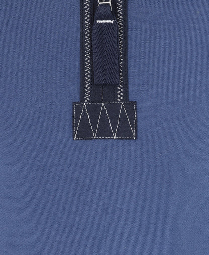 Close-up of Lazy Jacks Porthleven print sweatshirt kids with zip detail in navy fabric