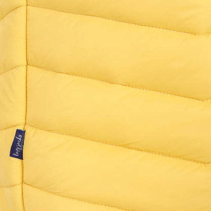 Close-up view of a side seam logo label of a womens Lazy Jacks GL2 lightweight padded gilet in Lemon Yellow.