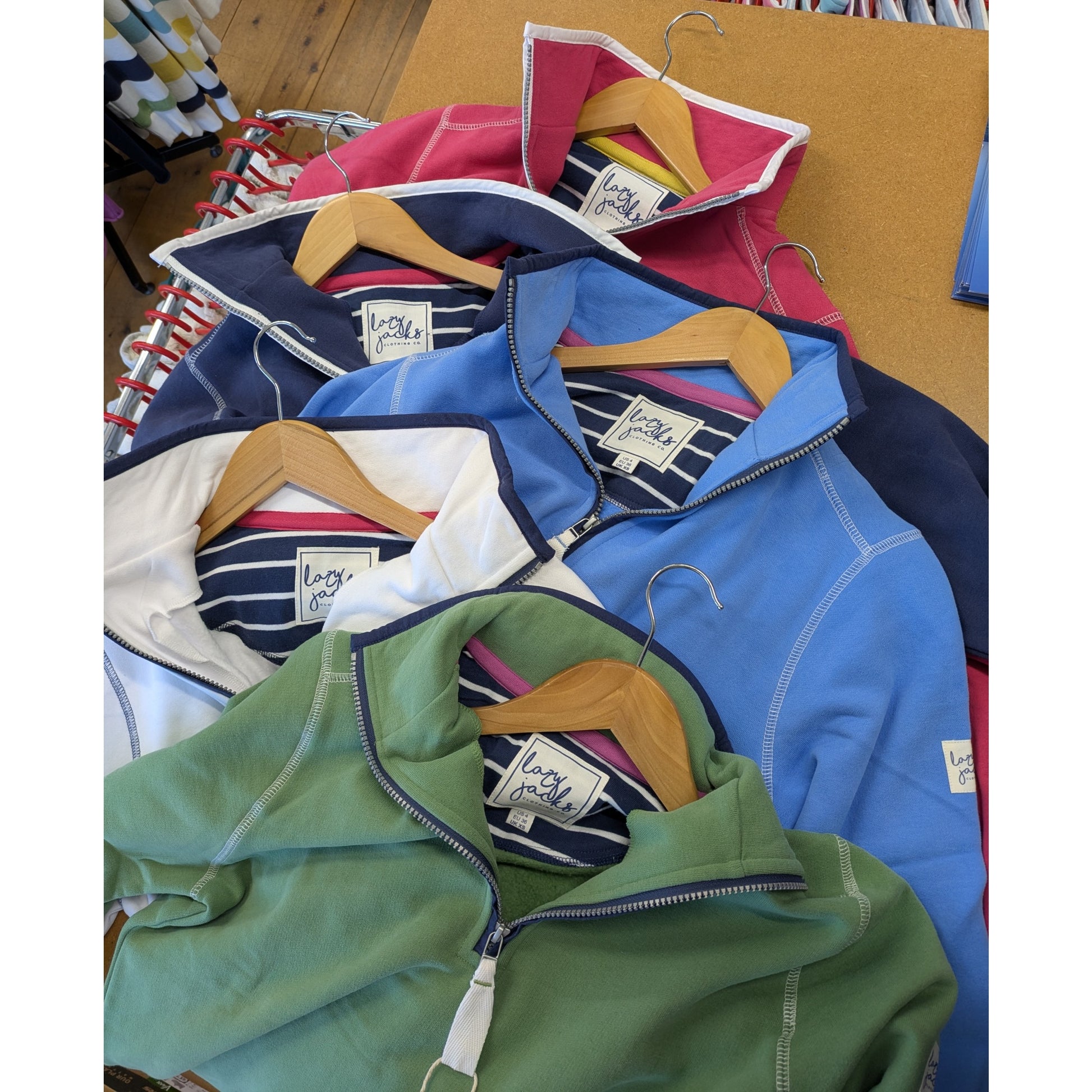 Selection of womens Lazy Jacks LJ3 zip neck sweatshirt in cherry, navy, blue, white and green