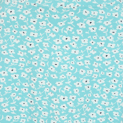 Close-up view of a women's Lazy Jacks LJ41 jersey skirt in turquoise with a white Buttercup floral pattern.