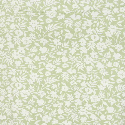 Close-up view of the grass green and white floral pattern of a women's Lazy Jacks LJ41 jersey skirt.