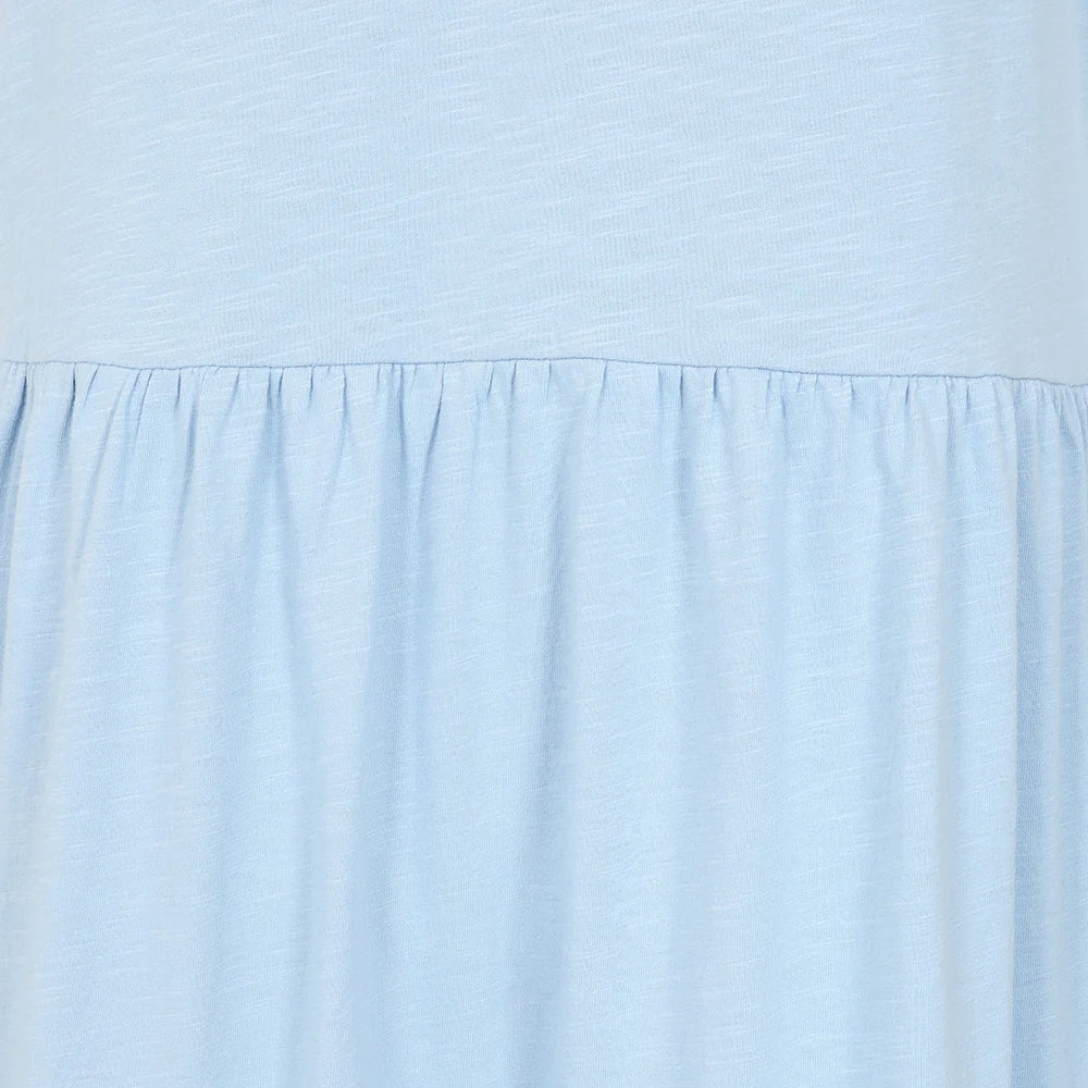 Close-up view of the gathered fabric of a Lazy Jacks LJ524 short sleeve dress in sky blue.