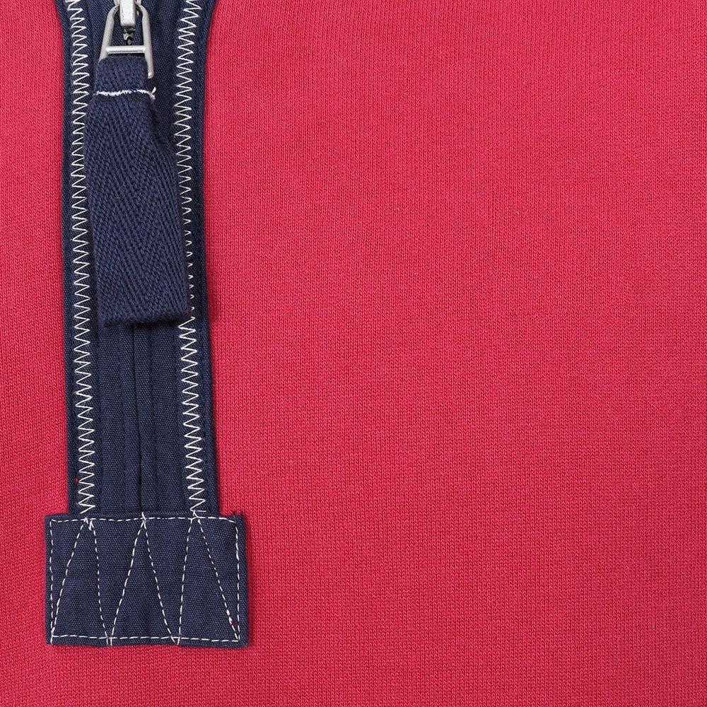 Close-up of Lazy Jacks Porthleven Sweatshirt zipper detailing in rich burgundy color
