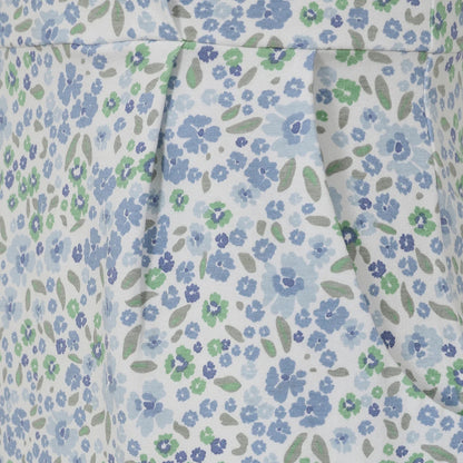 Close-up of Lazy Jacks womens floral print dress fabric with blue and green flowers