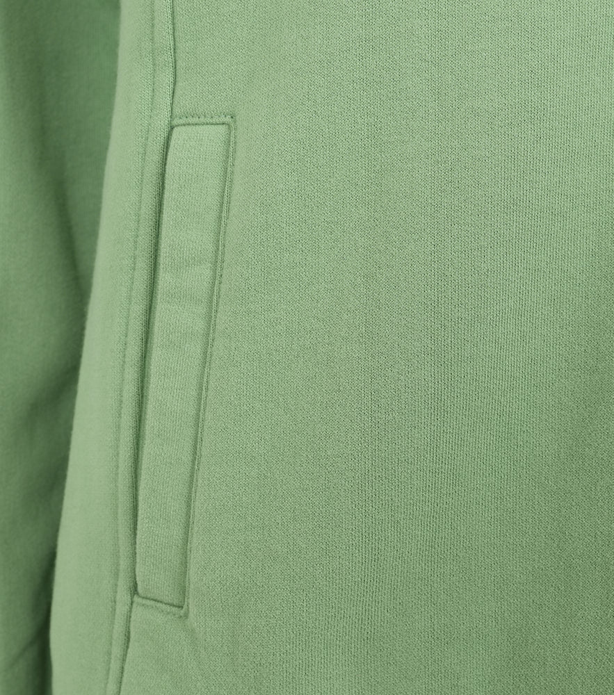 Close-up of pocket detail on Lazy Jacks womens zip sweatshirt Green fabric and stitching