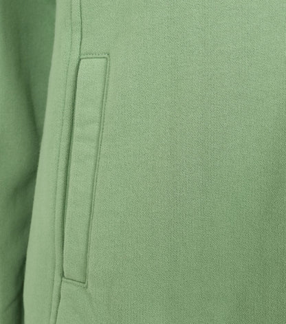 Close-up of pocket detail on Lazy Jacks womens zip sweatshirt Green fabric and stitching