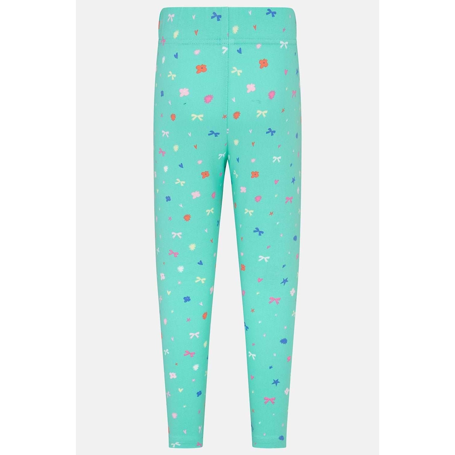 Back view of a pair of Lighthouse kids Mollie leggings in mint green with a bows, stars and floral pattern.