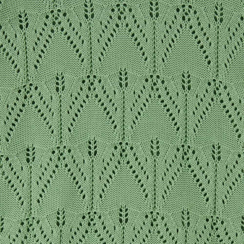 Close-up view of the geometric knit pattern of a Lighthouse Eden jumper in Soft Sage Green.