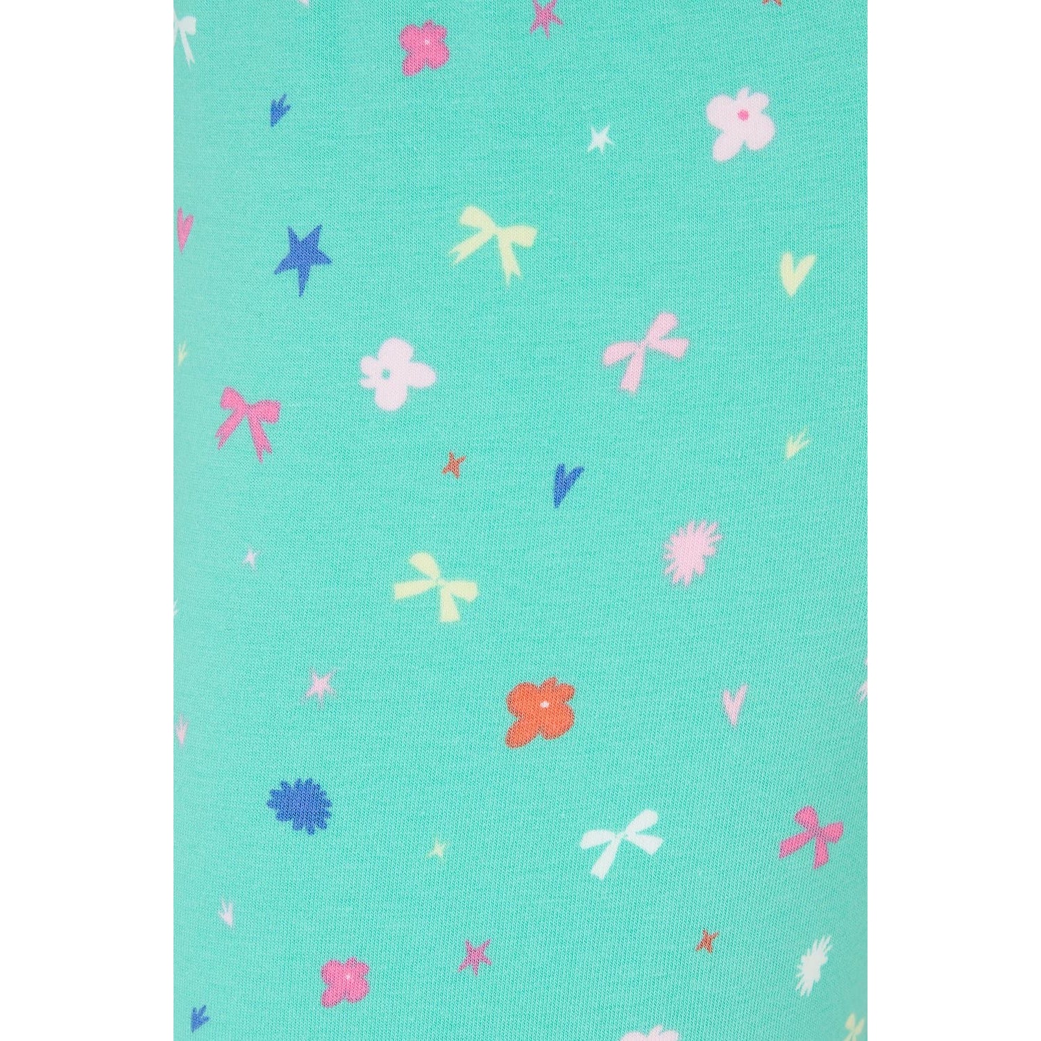 Close-up view of the fabric of Lighthouse kids Mollie leggings in mint green with a bows, stars and floral pattern.