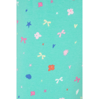 Close-up view of the fabric of Lighthouse kids Mollie leggings in mint green with a bows, stars and floral pattern.