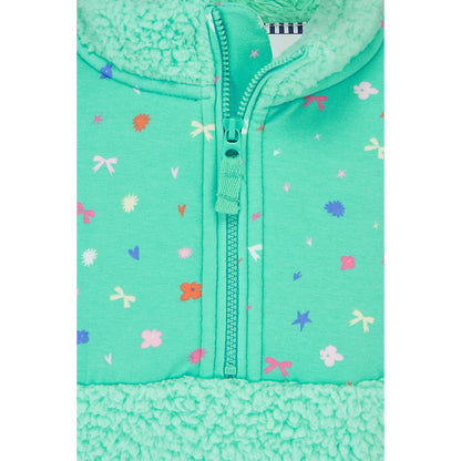 Close-up view of a kids Lighthouse Cassie fleece, in mint green with a tiffany bows, hearts, stars and floral print on the chest.