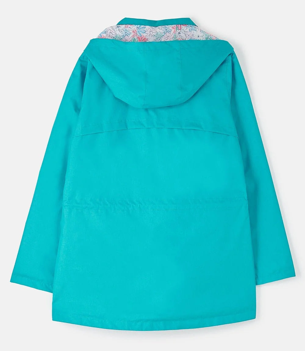 Lighthouse teal womens waterproof jacket with a hood and floral inner lining shown from the back