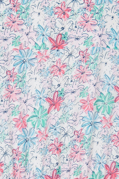Close-up of colorful floral pattern on a Lighthouse womens floral dress with pink blue and green flowers