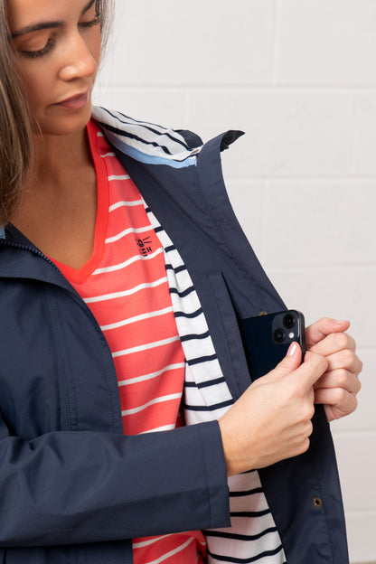 Lighthouse womens navy waterproof jacket with striped lining and secure inner pocket for phone