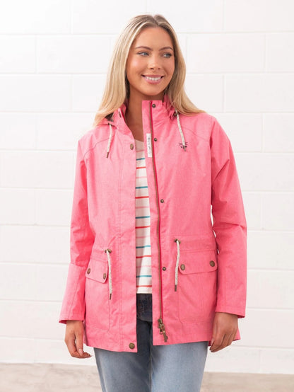 Lighthouse womens pink waterproof jacket with hood and front pockets worn by smiling woman